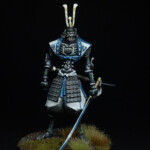 Kubban Une figurine de Okko Chronicles, Kubban, grand chasseur de démon de face qui tient une grande épée.