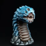 Une figurine du 7ème Continent, Ver de roche géant, un énorme ver de couleur bleu.