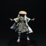 Akaska Une figurine d’Okko Chronicles, Akasha, personnage habillé d’une armure et portant sur la tête un chapeau de paille qui maintient un voile.