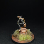 Nuuk Une figurine de Okko Chronicles, Nuuk de côté, grand rat sur son tonneau.