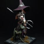 Une figurine de Brutality, Ophelia the conjurer vue de côté et de son chat décomposé.